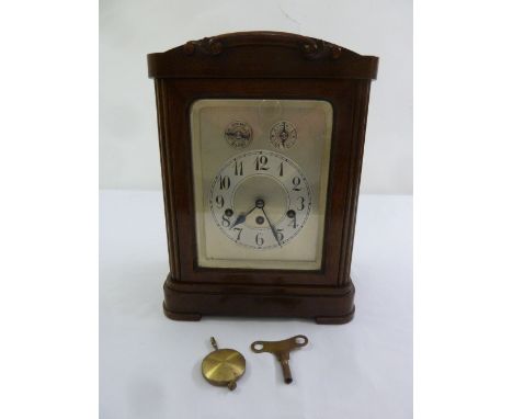 Jonghams of Nuremberg a rectangular mahogany cased mantle clock, silvered dial with Arabic numerals, three train movement to 