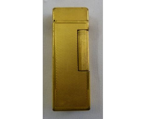 Dunhill gold plated engine turned rectangular cigarette lighter, A/F