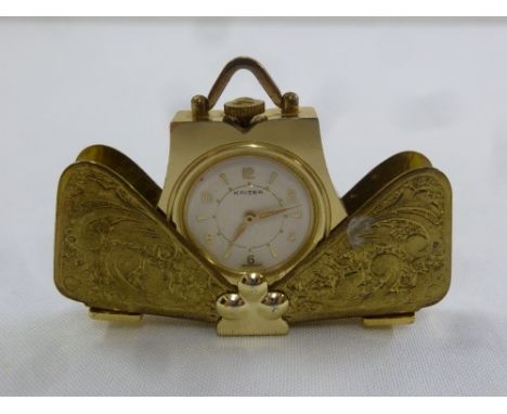 Kaiser gilt metal miniature folding travel clock, white enamel dial with Arabic numerals