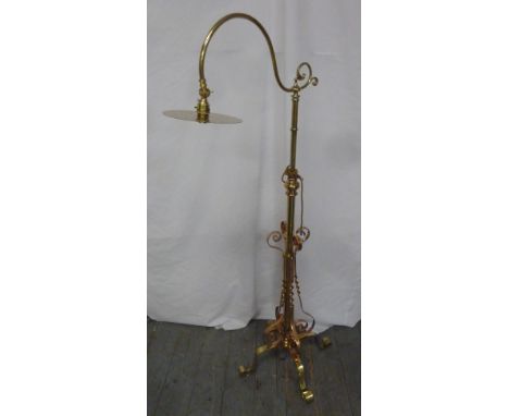 Art Nouveau style brass and copper telescopic standard lamp on three scroll supports