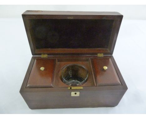 An Edwardian mahogany rectangular tea caddy with two compartments and glass mixing bowl and brass cartouche to cover, A/F