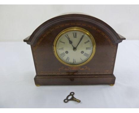 An Edwardian mantle clock inlaid mahogany, silvered dial, Roman numerals, to include key