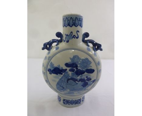 A Chinese blue and white moon flask with dragon side handles, A/F