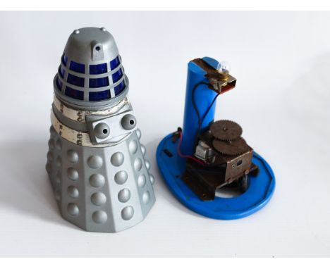 This is a vintage DALEK made by LOUIS MARX in the 1960's. Perhaps this could still be of some use to a collector.