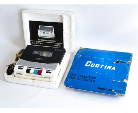 This is a FIVE TRANSISTOR TAPE RECORDER made by CORTINA in the 1960's. Complete in original packaging.