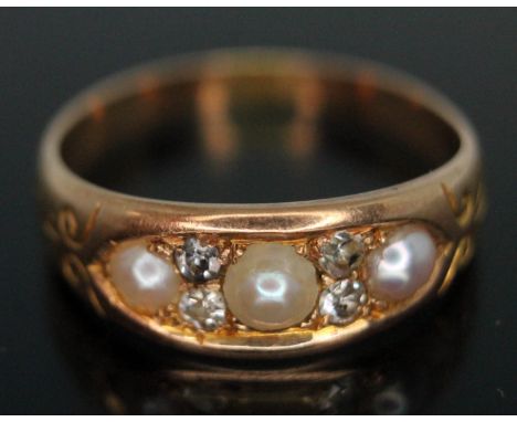 A Victorian diamond and pearl ring cluster ring, band unmarked, gross wt. 3.36g, size P.  