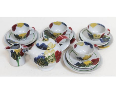 Janice Tchalenko "Poppy" for Dartington Pottery, a fourteen piece tea service comprising teapot, cream jug, four cups, four s