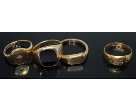 A group of four rings comprising three hallmarked 9ct gold, wt. 11.74g, and a hallmarked 18ct gold ring set with blue and col