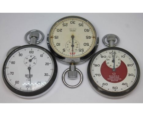 Three stopwatches comprising an Omega 'Prestons Timer Division Bolton', an Heuer and a Smiths.  Condition: all in good workin