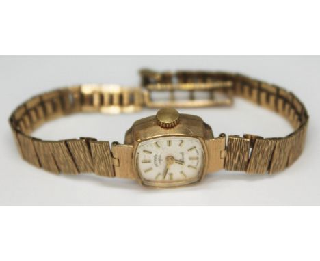 A ladies 9ct gold Rotary wristwatch with 9ct gold strap, gross wt. 14.66g.  