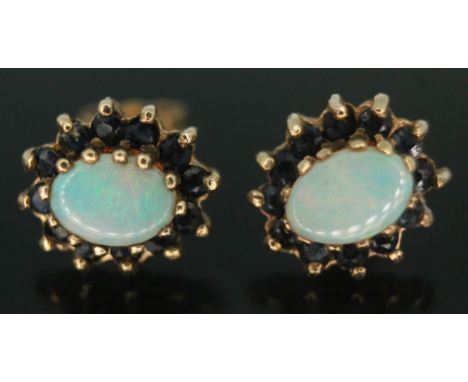 A pair of hallmarked 9ct gold precious opal and sapphire cluster earrings, setting measuring approx. 11mm x 9mm, gross wt. 2.