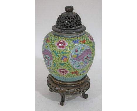 A Chinese 19th century ginger jar, with pierced and carved wood cover and stand, total height 41cm.Condition: some minor surf