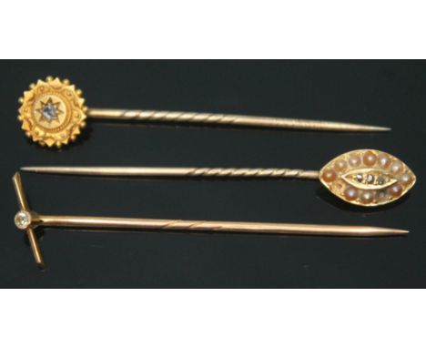 A group of three stick pins, two unmarked set with diamonds/pearls and another marked '15ct', gross wt. 4.59g.  