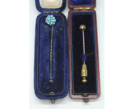 Two stick pins, one set with a cluster of turquoise cabochons and the other a yellow metal sphere, each with box.  