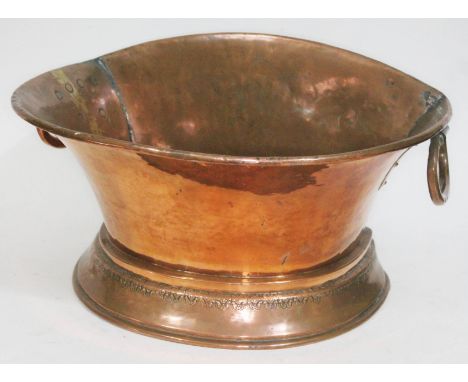 A Dutch copper wine cistern and well.  