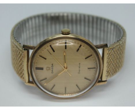 A 1969 hallmarked 9ct gold Omega Geneve 131.25016 wristwatch, with signed gold tone dial, hands and hour batons with black in