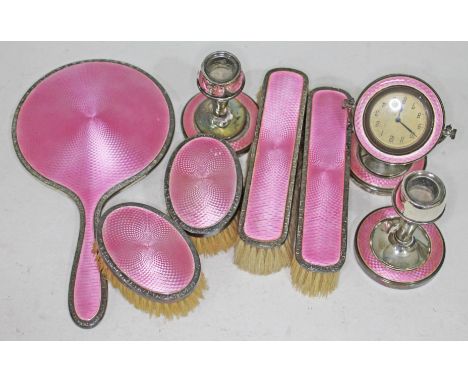 A hallmarked silver and pink enamel dressing table set.&nbsp;Condition - clock not currently running, fixing screws on clock 