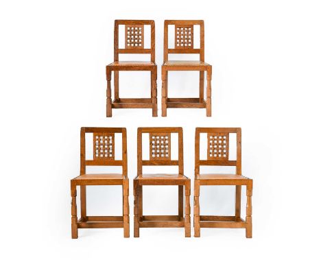 Workshop of Robert Mouseman Thompson (Kilburn): Five English Oak Lattice Back Dining Chairs, tan hide upholstered seats, on o