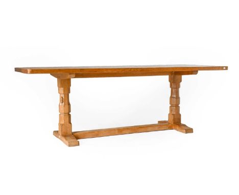 Workshop of Robert Mouseman Thompson (Kilburn): An English Oak 7ft Refectory Dining Table, the adzed rectangular top on two o