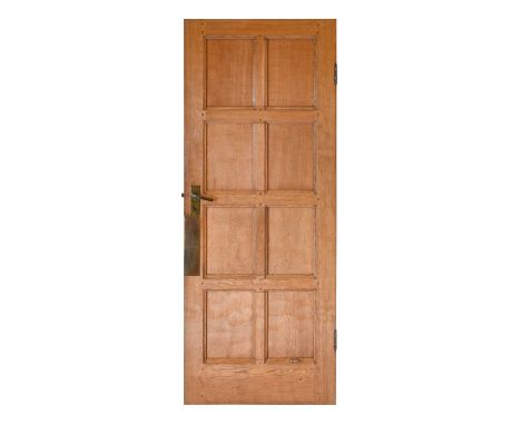 Workshop of Robert Mouseman Thompson (Kilburn): An English Oak Panelled Door, with carved mouse trademark, 76cm wide 196cm hi