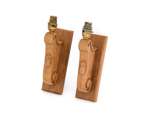 Workshop of Robert Mouseman Thompson (Kilburn): Two English Oak Single Wall Light Brackets, each with a rectangular mounting 