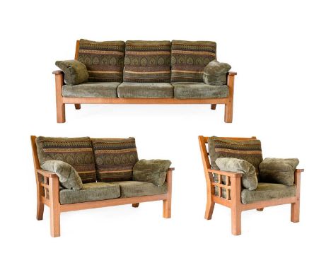 Knightman Family: An Old Mill Furniture (Balk): An English Oak Three Piece Suite, comprising Three-Seater Sofa, with lattice 
