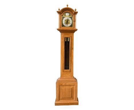 Sidney (Sid) Pollard (1914-1994) of Thirsk: An English Oak Small Longcase Clock, arched pediment with three turned finials, b