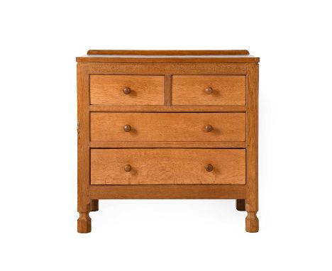 Workshop of Robert Mouseman Thompson (Kilburn): An English Oak Chest of Drawers, 1960s/70s, with raised upstand, above two sh