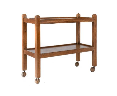 Workshop of Robert Mouseman Thompson (Kilburn): An English Oak Tea Trolley/Dinner Wagon, with two tiers both with raised side