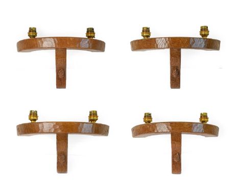 Workshop of Robert Mouseman Thompson (Kilburn): Four English Oak Double Wall Light Brackets, semi-circular with two upward fa