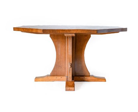 Workshop of Robert Mouseman Thompson (Kilburn): An English Oak 4'6" Octagonal Dining Table, the adzed top on a cruciform base