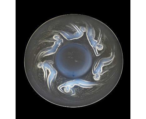 René Lalique (French, 1860-1945): An Opalescent and Clear Glass Ondines Plate, designed 1921, decorated in relief with six si