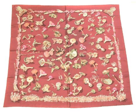 A Hermès "Champignons Mushrooms" silk scarf by Françoise de la Perrière, circa 1986, the maroon, pink, cream and brown patter