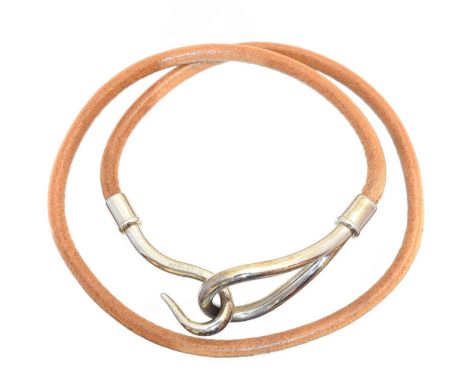 A Hermès Jumbo Double Tour bracelet, the brown epsom calfskin strap with stainless steel hook clasp, signed Hermès.37.5cmCond