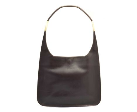 A Gucci Vintage Shoulder Bag, the smooth brown leather exterior with embossed maker's logo, gold tone hardware and single han