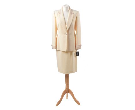 A set by Albert Nipon Evening, comprising a pale yellow camisole with irridescent chevron beading, a mid length skirt, and a 