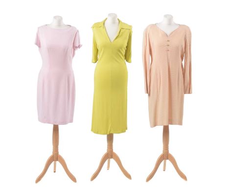 Three designer summer dresses, to include a yellow mid length dress by Gucci, a pale pink dress with bows to sleeves by Mugle