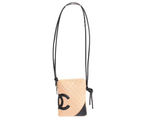 A Chanel Cambon Zip Shoulder bag, circa 2004-5, the beige smooth leather quilted exterior with smooth black leather maker's m
