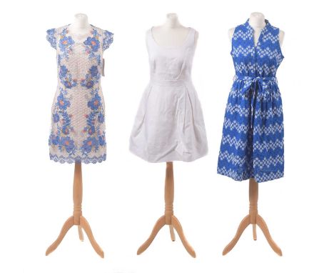 Four Karen Millen dresses, to include a halterneck dress, a tie waist dress, a crochet dress and one other, sizes S to 14 (4)