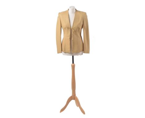 A leather jacket by Escada, the beige leather fitted jacket with tie-front detailing, size 36.Condition report: Overall condi