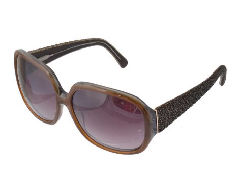 A pair of Linda Farrow sunglasses, the brown glitter acetate frames with caviar effect arms, signed Linda Farrow Luxe. With c
