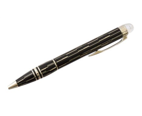 A Montblanc Starwalker Black Mystery Ballpoint Pen, the black resin body heightened with laser-engraved surface, the cap with