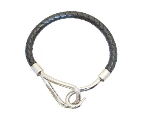 A Hermès Jumbo bracelet, the black swift calfskin braided strap with silver-tone hook fastening, signed Hermès.18cmCondition 
