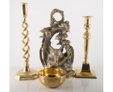 Cast brass doorstop, modelled with hunting trophies, 29cm, two pairs of brass candlesticks, and Indian brass bowl, and a dish