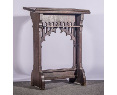 Two oak gothic style prayer desks/prie-dieu, one 76cm wide with shelf under, the other without 89cm wide.