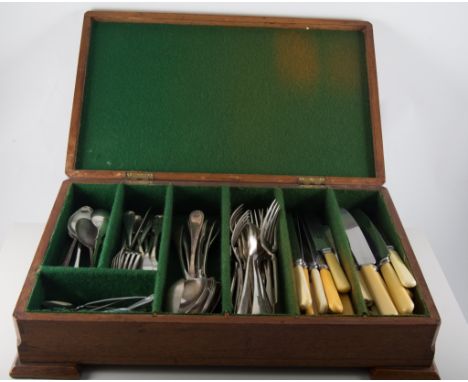 A mahogany canteen of nickel cutlery and knives, oak box of EPNS crested spoons, a silver table spoon and two teaspoons, a Sm