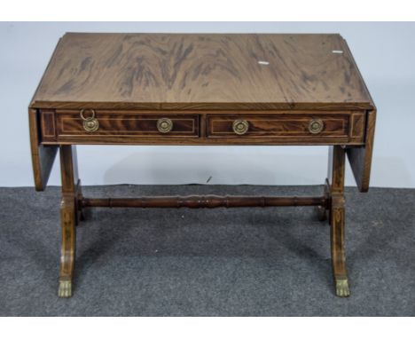 Rosewood low sofa table, inlaid stringing, two frieze drawers, pillar end supports, width 117cm.