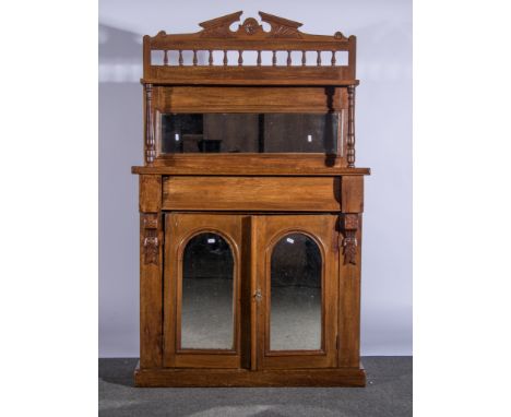 Small mirror-backed chiffonier, frieze drawer above pair of arch mirrored cupboard doors, rectangular mirror back with shelf 