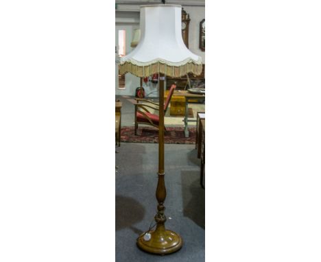 Walnut standard lamp, fluted column, with shade, height 185cm.