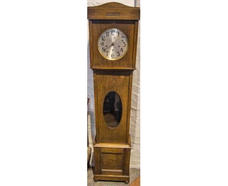 Oak cased grandmother clock, silvered dial, movement striking on seven gongs, 173cm.